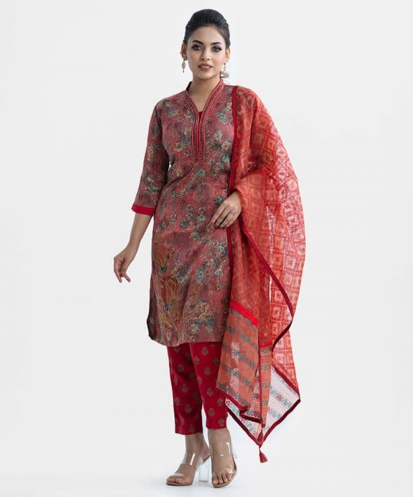 Floral printed exclusive salwar kameez in Muslin & crepe fabric. High neck, three-quarter sleeves and karchupi at the front of kameez. With a muslin dupatta and crepe palazzo pants.