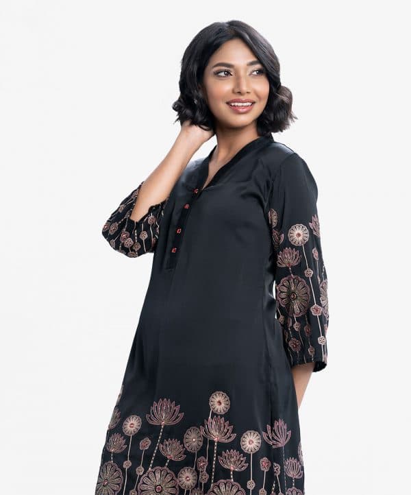 Exclusive kameez from Nargisus by Le Reve in zoom fabric. V-neck, full-sleeves. Floral print detail with heavy karchupi at front hemline and sleeves.