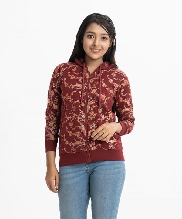 Teen girls printed hoodie sweat shirt in french terry fabric.. Adjustable drawstring at hood. Full sleeves and all-over floral print.