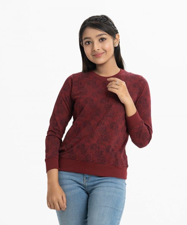 Teen girl's printed sweat shirt in terry fabric. Round collar, full sleeves, and a straight hem. Featuring narrow ribbing at the cuffs, and hem.
